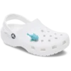 Ciondoli Jibbitz™ 3D a forma di squalo che cambiano colore con la luce UV Ciondoli Jibbitz™ 3D a forma di squalo che cambiano colore con la luce UV