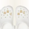 Ciondoli Jibbitz™ con la lettera “a” dorata a forma di bolla Ciondoli Jibbitz™ con la lettera “a” dorata a forma di bolla